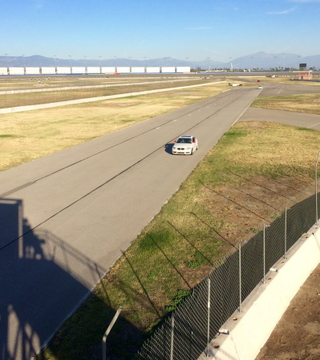 Illustration for article titled Grip Engaged: Smashing Lap Times at Auto Club Speedway